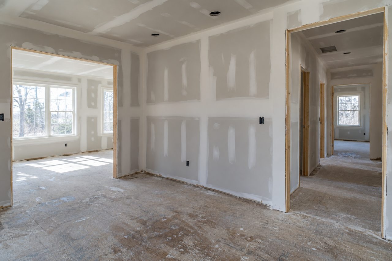 Fresh drywall with taped seams in an interior renovation